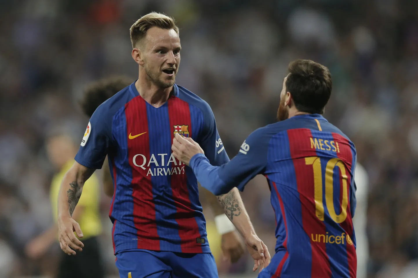Ivan Rakitic ja Lionel Messi.