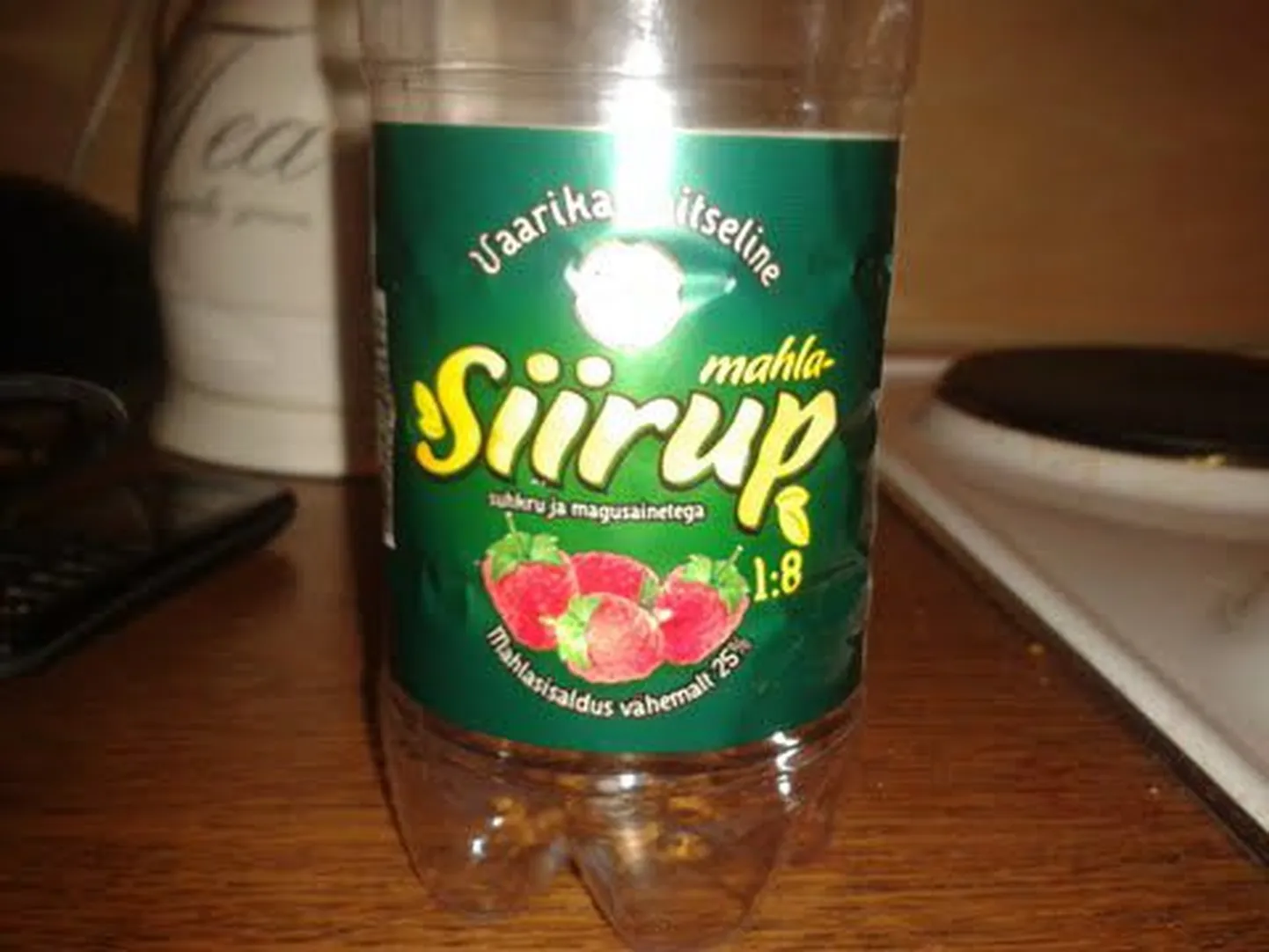 Aura siirupipudel.