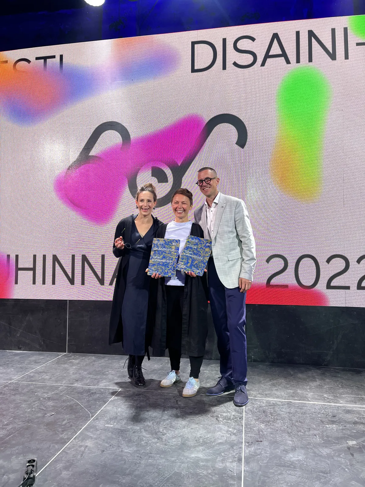 Grete Arro, Helelyn Tammsaar, and Colonel Mati Tikerpuu received the award for Best Service Design at the 2022 Estonian Design Awards.