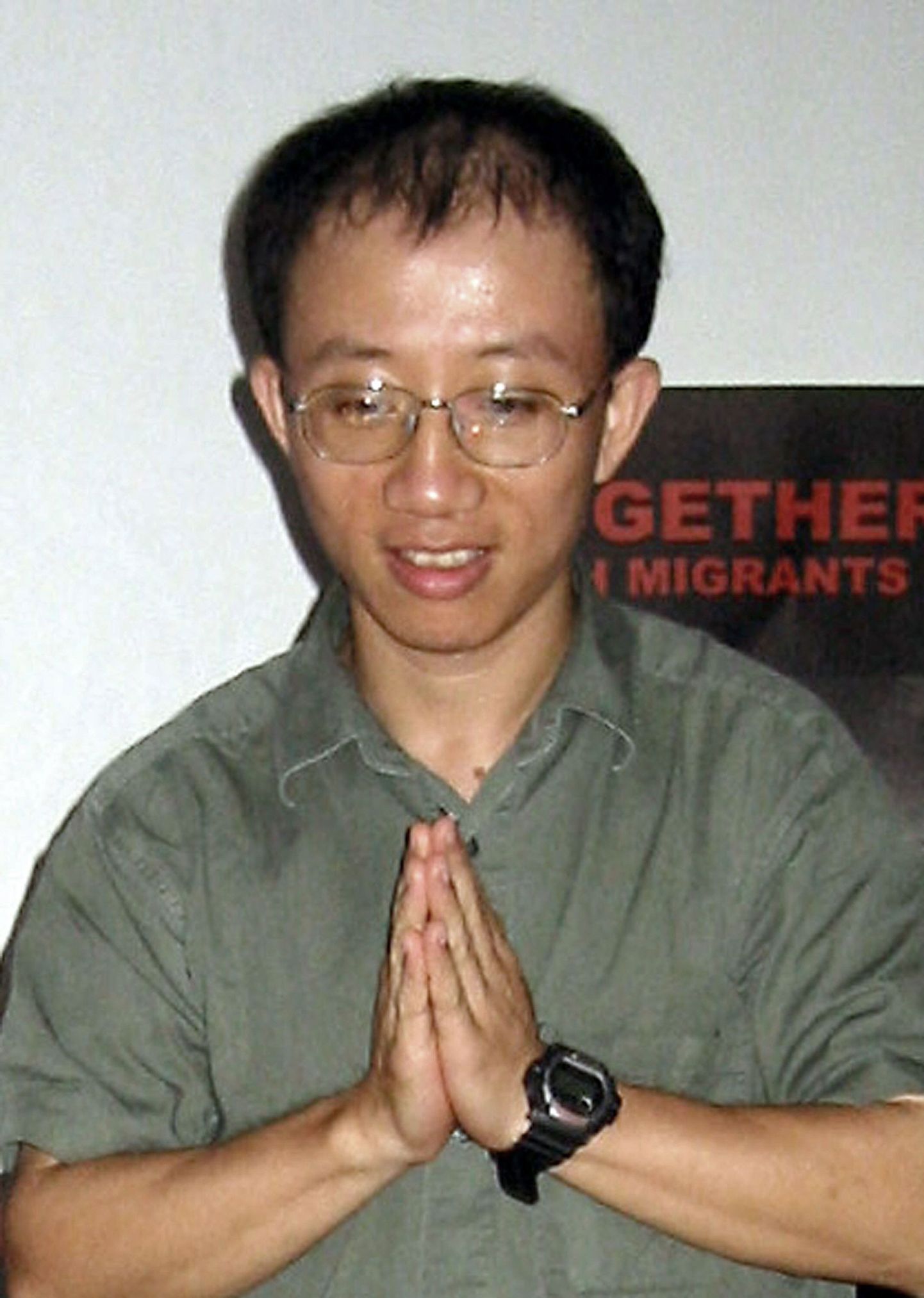 Hiina dissident ja aidsivastase võitluse aktivist Hu Jia dateerimata fotol.