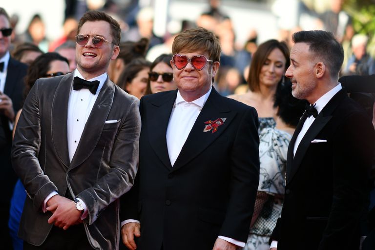 Elton John, David Furnish ja Taron Egerton Cannes'is 2019