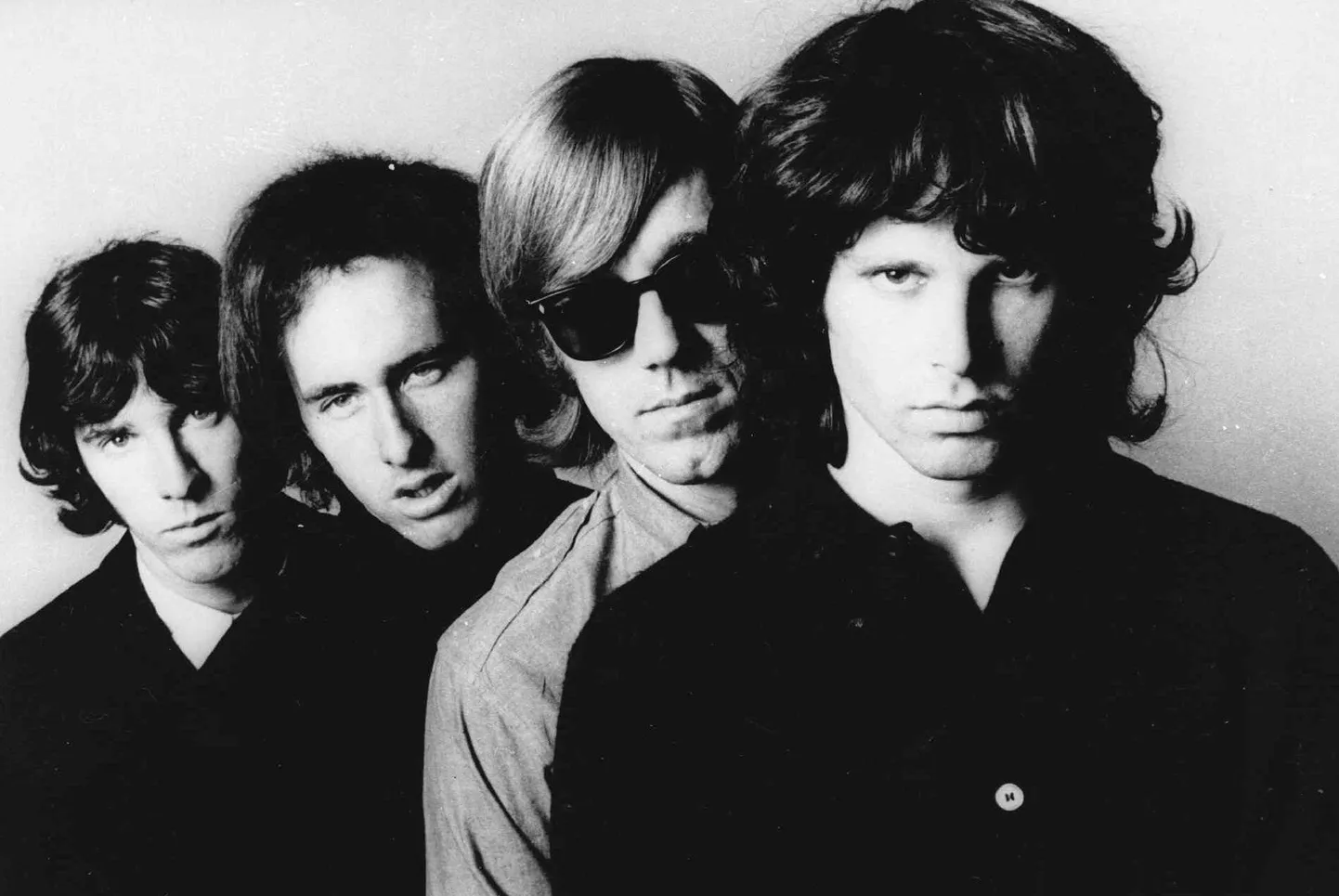 The Doors. Джим Моррисон (слева).