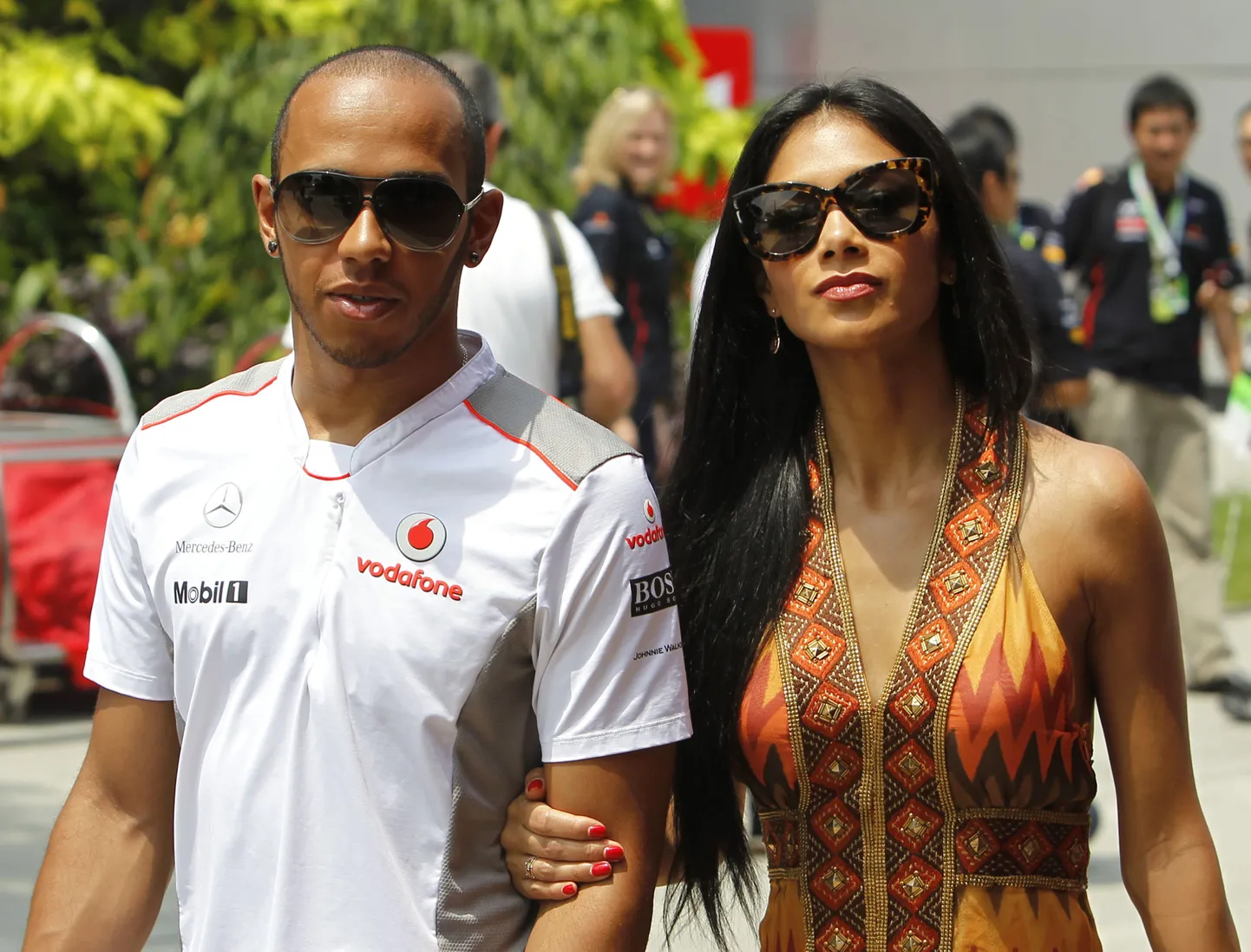 McLareni meeskonna piloot Lewis Hamilton koos tüdruksõbra Nicole Scherzingeriga Malaisia GP-l.