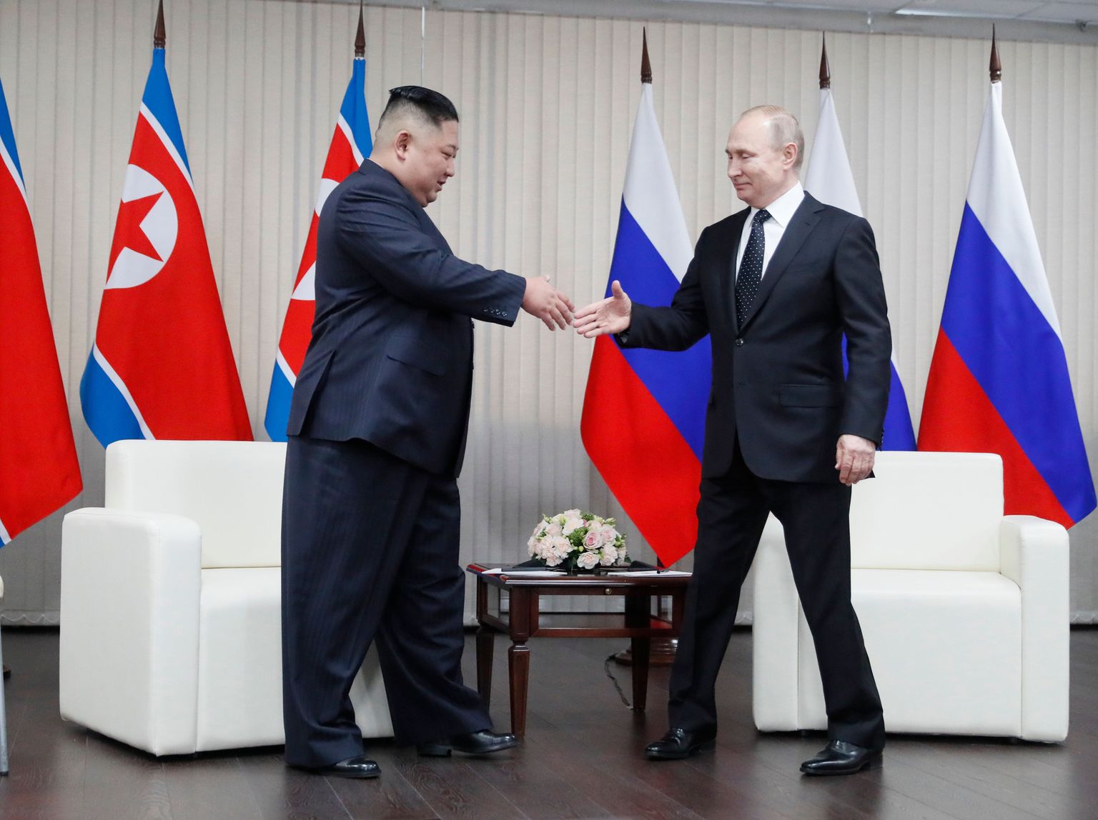 Глава Северной Кореи Ким Чен Ын и президент России Владимир Путин