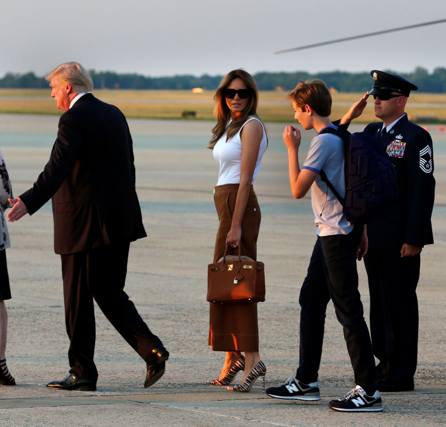USA president Donald Tump poja Barroni ja abikaasa Melania Trumpiga.