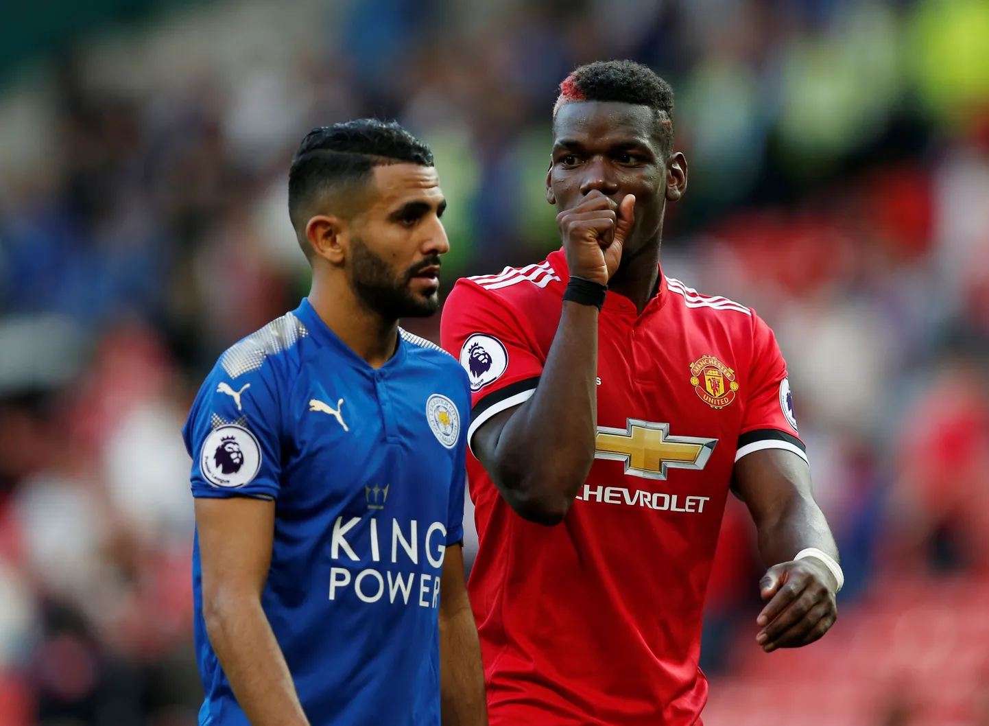 Riyad Mahrez (sinises)