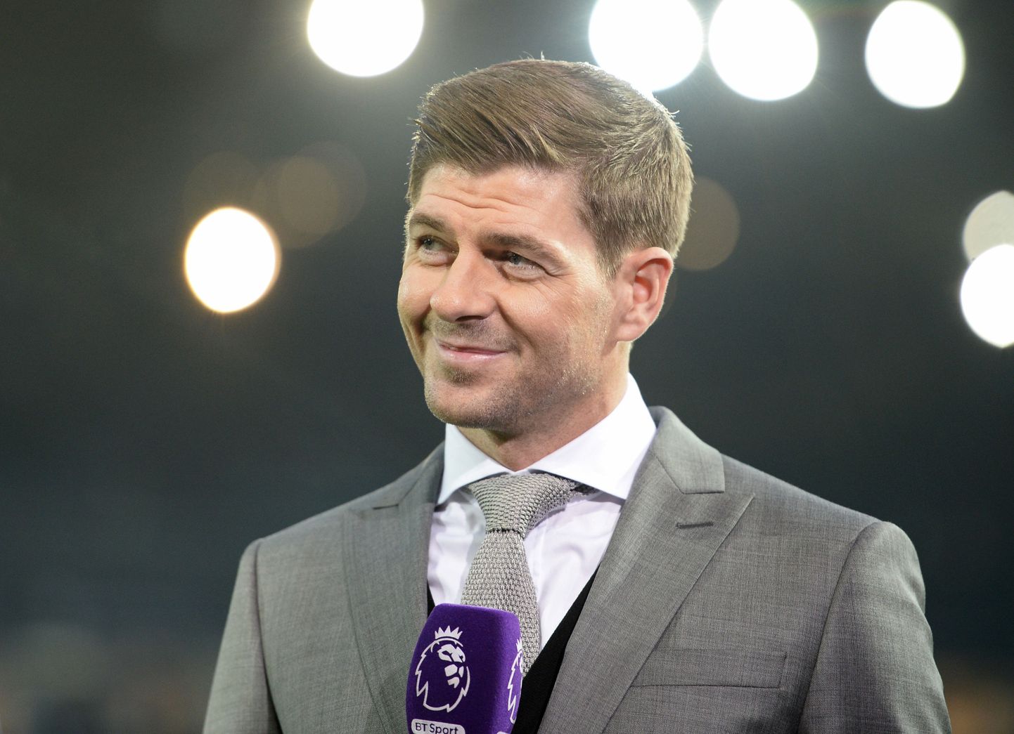 Former Liverpool and England captain Steven Gerrard, seen working for television ahead of the English Premier League football match between West Bromwich Albion and Manchester United at The Hawthorns stadium in West Bromwich, central England, on December 17, 2016.
 / AFP PHOTO / Oli SCARFF / RESTRICTED TO EDITORIAL USE. No use with unauthorized audio, video, data, fixture lists, club/league logos or 'live' services. Online in-match use limited to 75 images, no video emulation. No use in betting, games or single club/league/player publications.  /