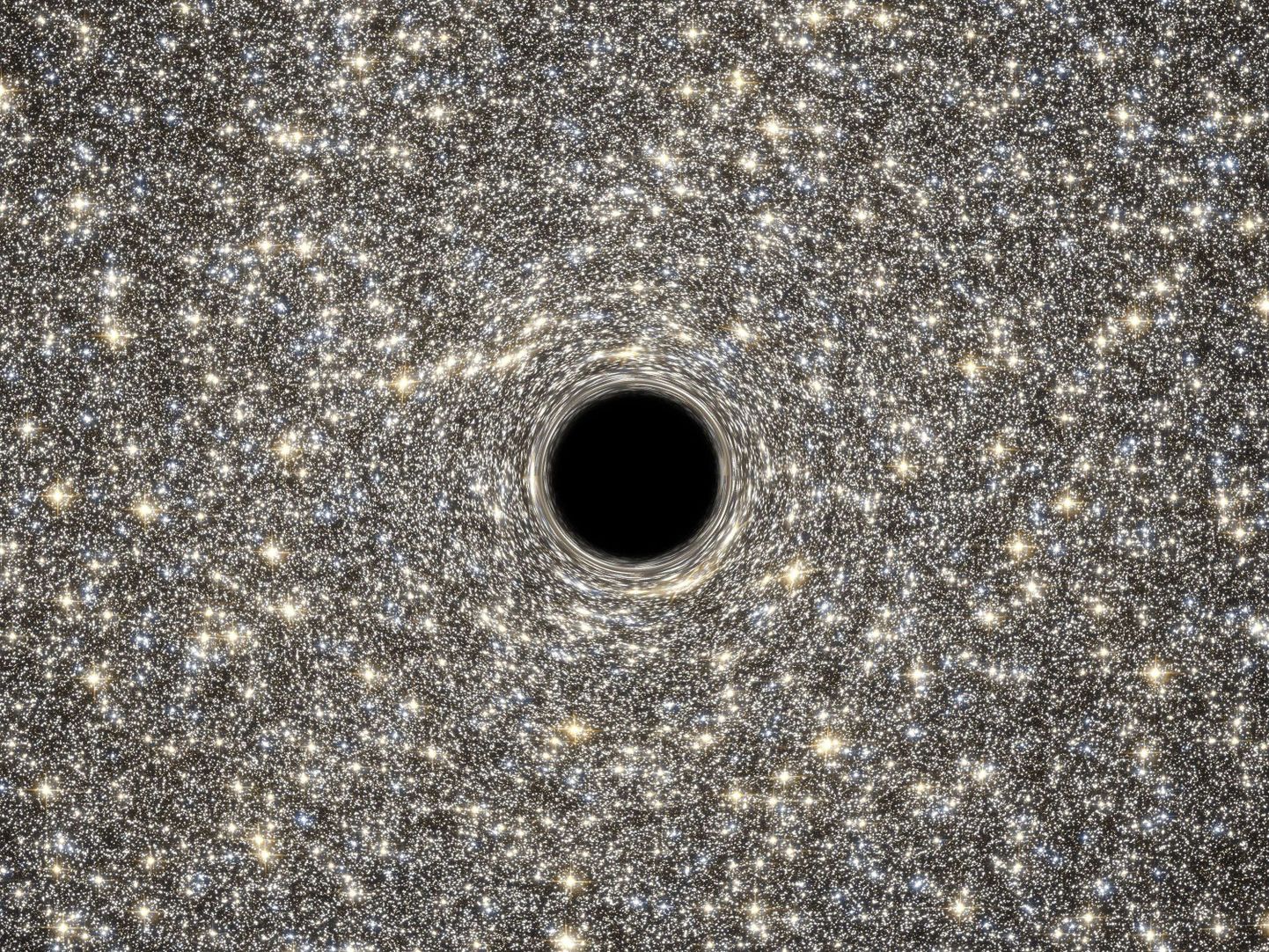 Galaktika M60-UCD1, millel on massiivne must auk